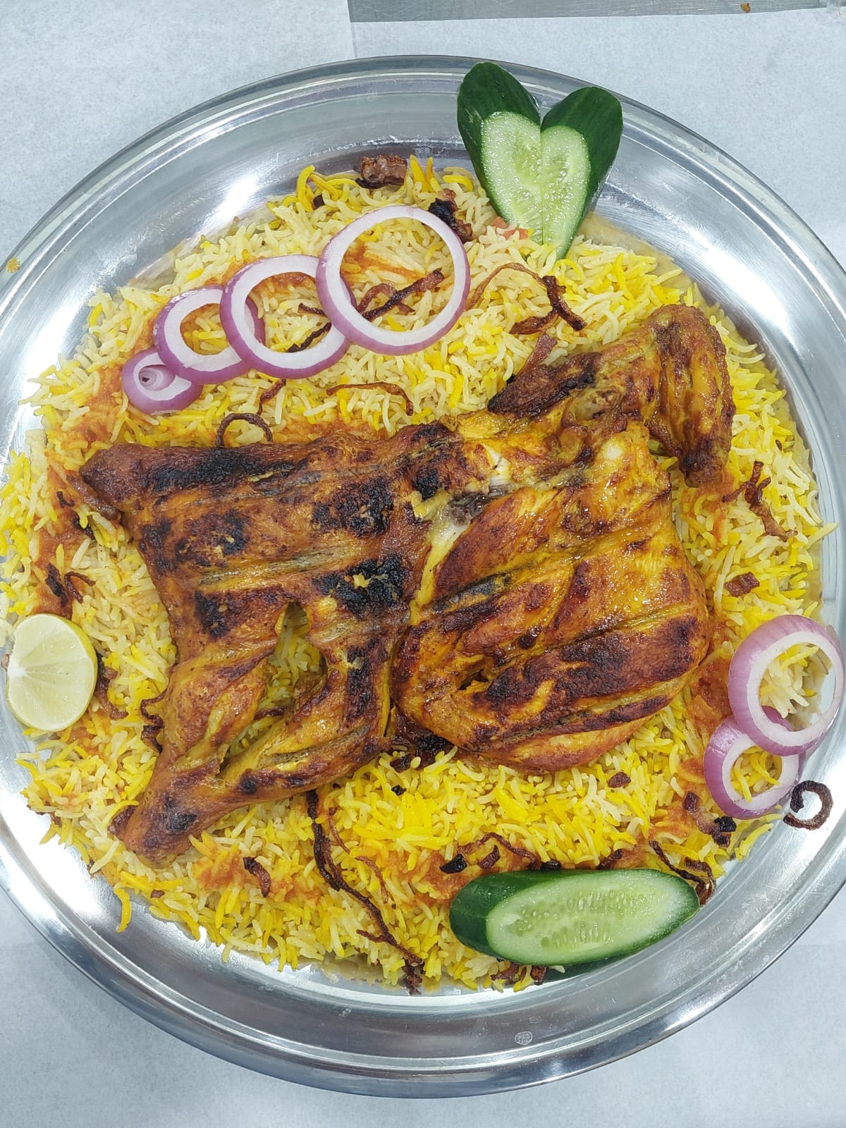 نصف دجاج على الفحم