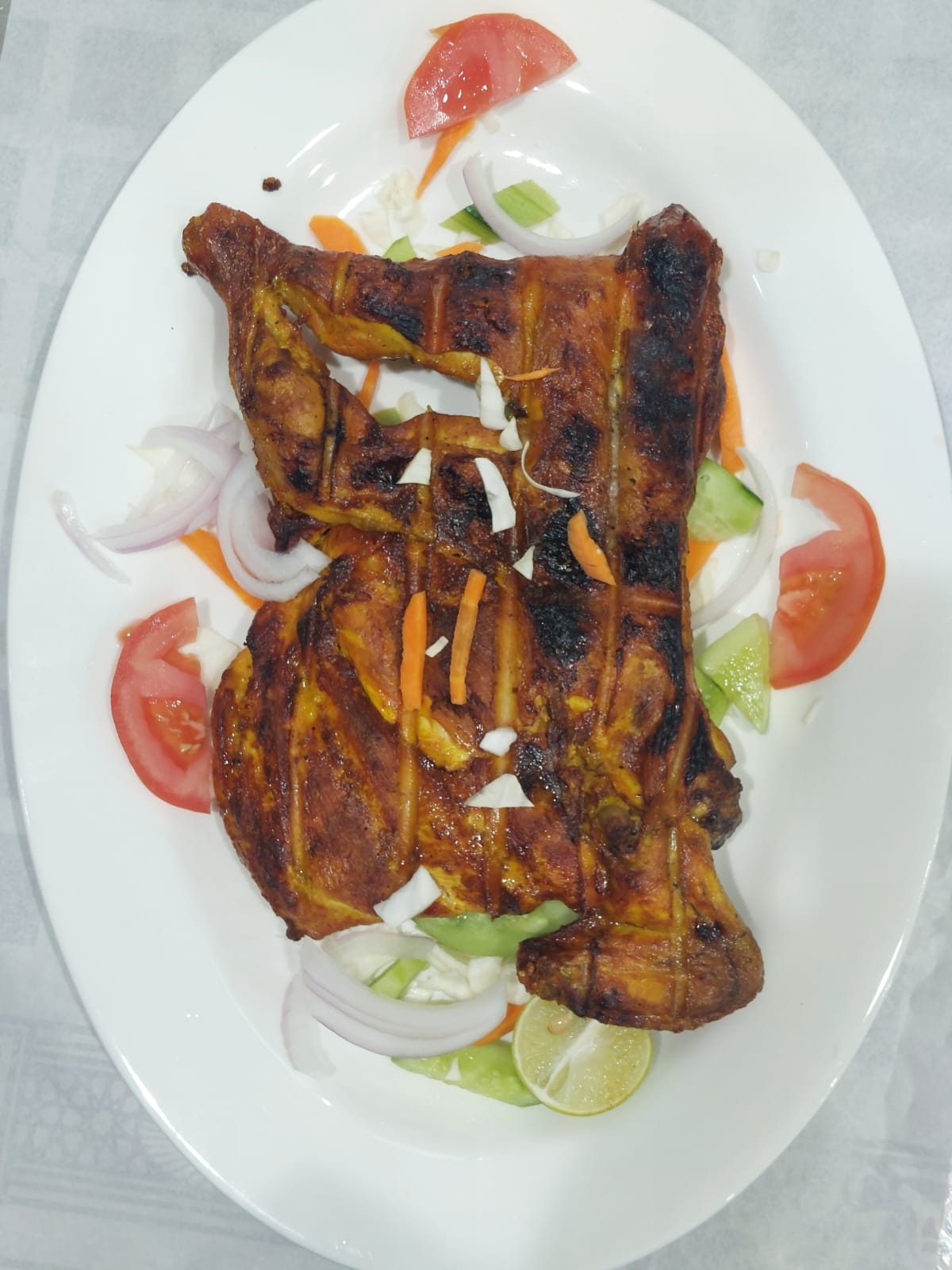 نصف دجاج على الفحم